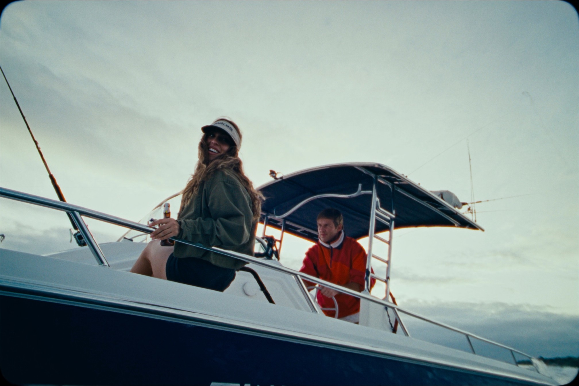 Two on the boat, fishing